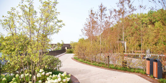 The path along the perimeter of the Ruan Reflection Garden boasts Des Moines River views and thoughtful plantings.