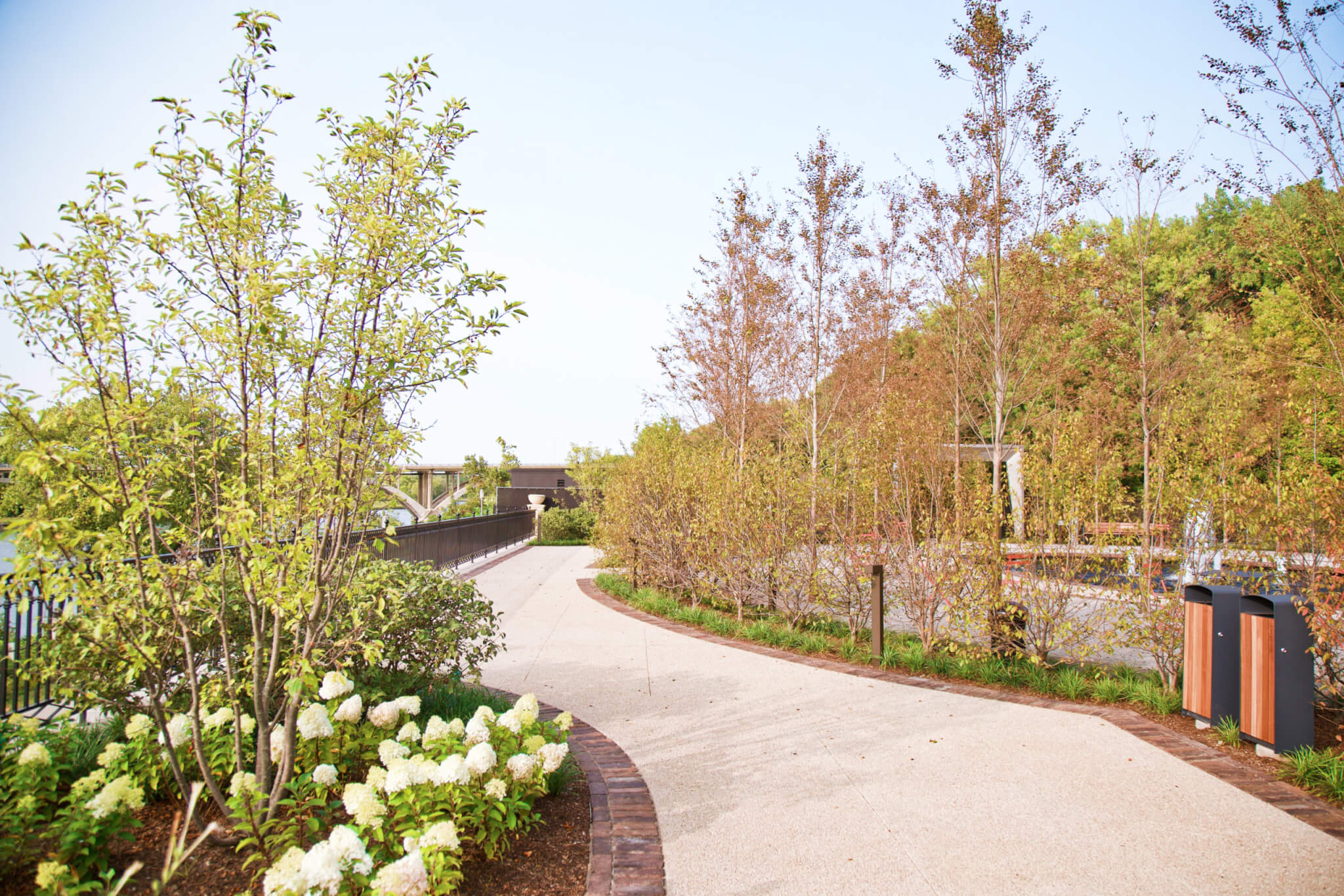 The path along the perimeter of the Ruan Reflection Garden boasts Des Moines River views and thoughtful plantings.