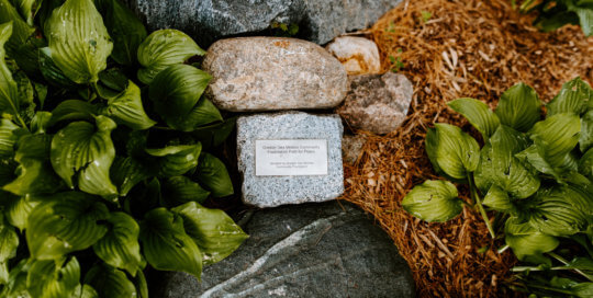 A stone denoting the Greater Des Moines Community Foundation Path for Peace.