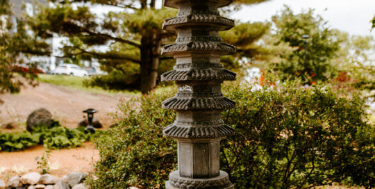 A stone pagoda featured in the garden.